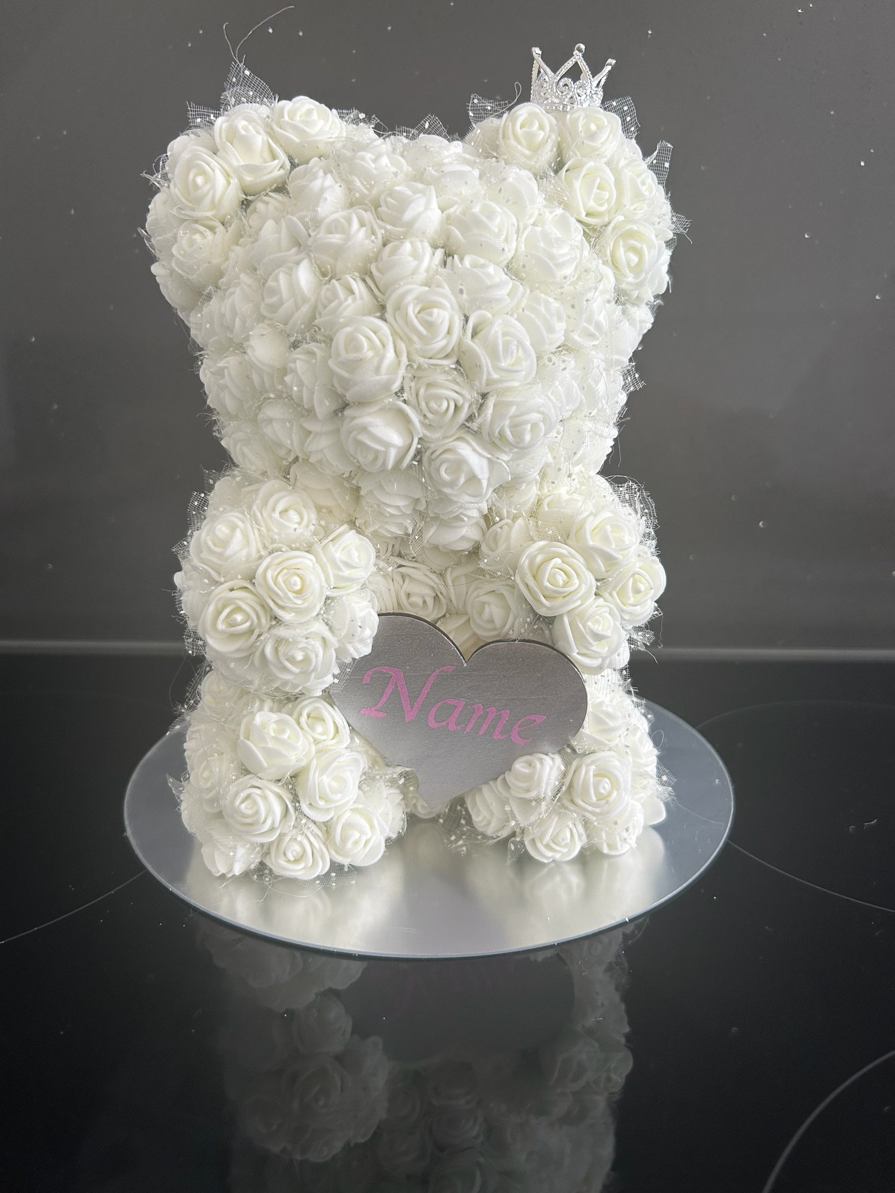 Hartes Handmade white foam rose teddy bear with a sparkling crown and personalised heart plaque on a silver base